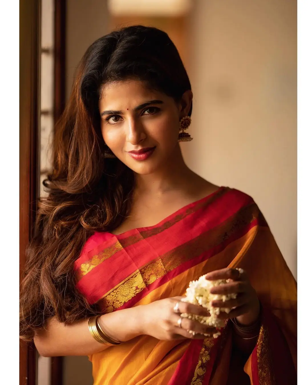 Indian Girl Iswarya Menon In Traditional Orange Saree Sleeveless Blouse